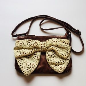 Claire’s Brown Mini Handbag with Lace Bow Decor